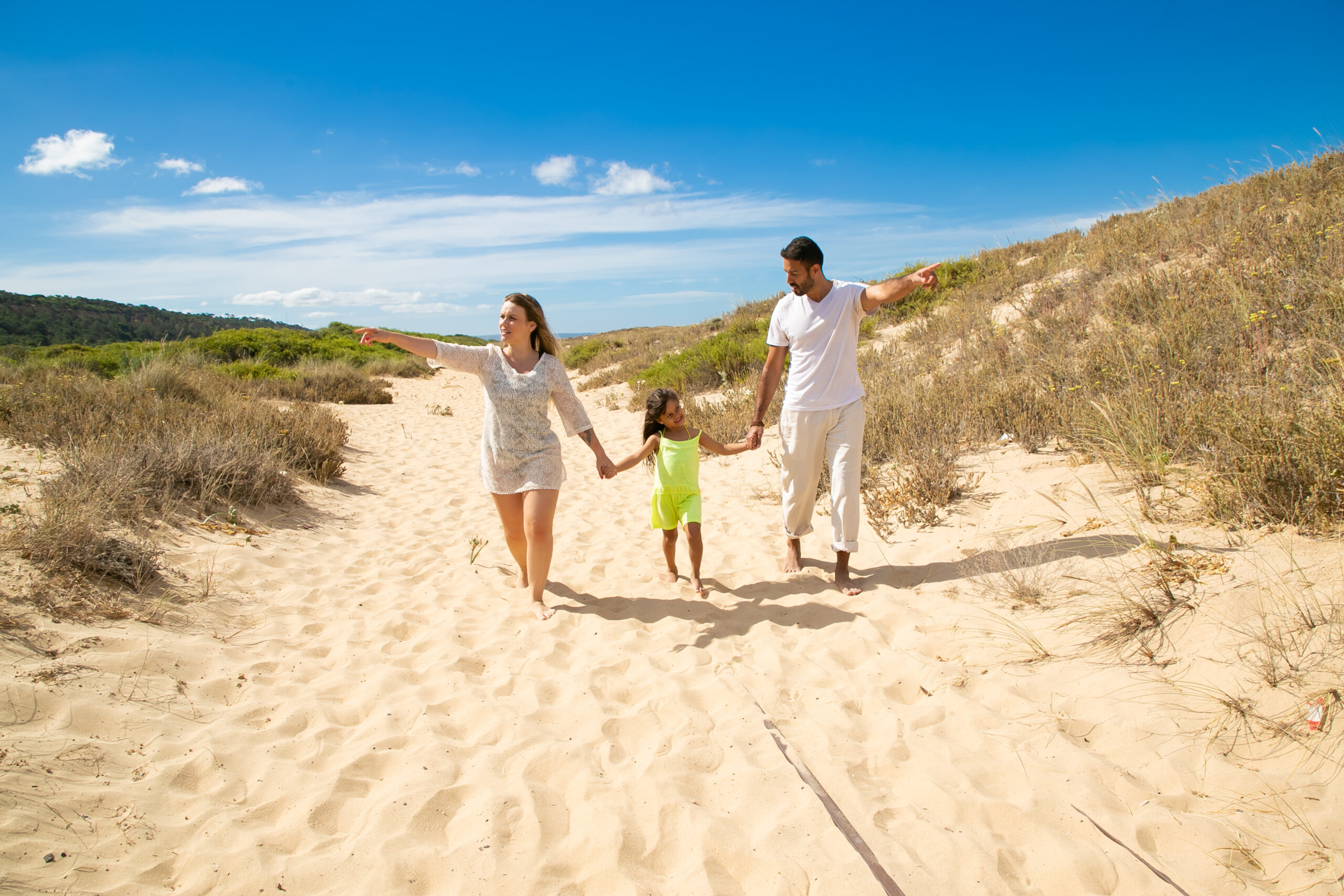 young family couple and little kid in summer clothes